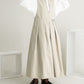 pleated jumper skirt (beige)